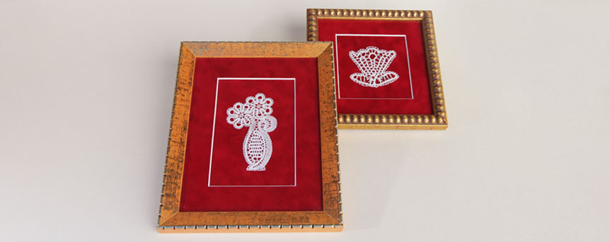 Čipke in okvirji Jesenko